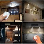 Tri zidne lampe u ambijentu moderne spalnice