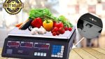 Digitalna vaga za merenje u upotrebi na pijaci — merenje voća i povrća