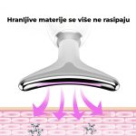 električni masažer za lice — u prostoru