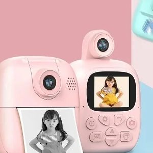 fotoaparat za decu sa instant štampačem — u upotrebi