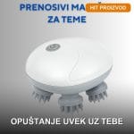Prenosivi masažer za teme sa silikonskim nastavcima na beloj pozadini