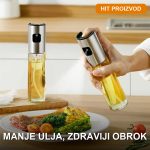 Staklena prskalica za ulje 100ml na kuhinjskom pultu pored maslinovog ulja
