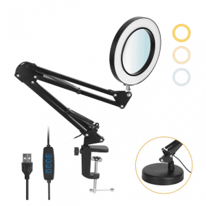 stona LED lampa sa lupom — u upotrebi