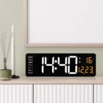 Digitalni LED sat postavljan na noćnom stoliku i korišćen tokom noći
