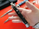 stiletto nož na preklop - u prostoru